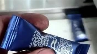 دستگاه بسته بندی خرما شکلاتی